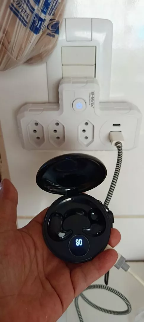 Foto de cliente: adaptador carregando fone de ouvido bluetooth